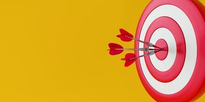 Close up red dart hitting target on yellow background. photo