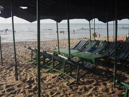 beach chair on sand sea photo