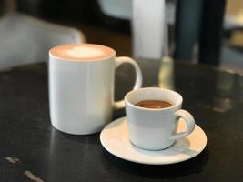 Hot coffee cup on table photo