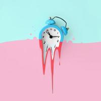 Time is running out. Melted blue alarm clock photo