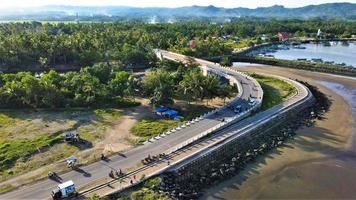 Ciamis, West Java-Indonesia, 12 May 2022 - Beautiful panoramic aerial view of Pangandaran beach. photo