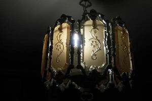shining chandelier with energy saving lamp photo