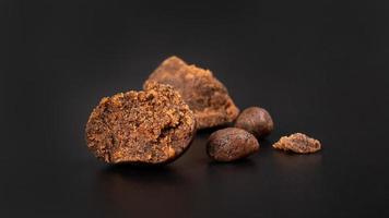 cannabis concentrate on black background, marijuana hashish photo