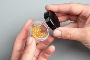 golden cannabis resin in a box, wax with high thc photo