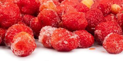 iced frozen red strawberries berry closeup photo