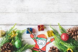 Top view of Christmas decoration on wooden table background photo