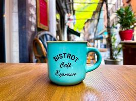 Vintage Coffee Cup placed on a table photo