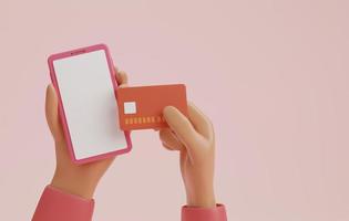 Hand holding a smartphone and credit cards on a light pink background. photo