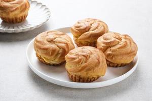 Vanilla Soes Cakes, Sus Vla, A traditional French choux dough filled with custard. photo