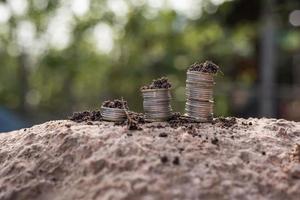 A pile of coins for finance and banking concept of saving money and growing finances photo