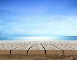 indigo wood table top and blue background Products can be placed or cut for display - concept, beach and summer photo