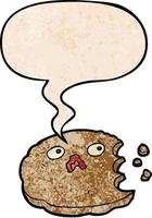 cartoon bitten cookie and speech bubble in retro texture style vector