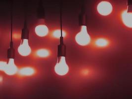 Open Light bulb on black background.add red color photo