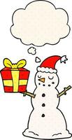 cartoon snowman with present and thought bubble in comic book style vector