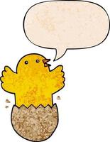 cartoon hatching bird and speech bubble in retro texture style vector