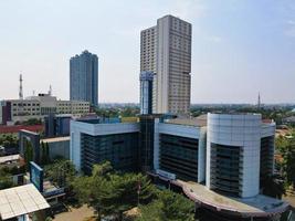 Jakarta -Indonesia, 17 May 2022 - Beautiful aerial view - Traffic, office buildings and apartments. photo