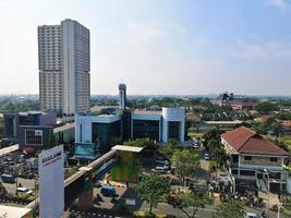 Jakarta, Indonesia, May 11, 2022 - Beautiful aerial view of office buildings and traffic. photo