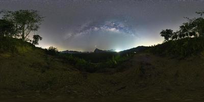 VR360 degree The Milky Way over the mountain in sea - Samed Nang Nee, Phang Nga Province, Thailand photo