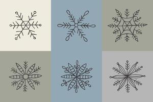 A set of hand-drawn snowflakes. Vector illustration in doodle style. Winter mood. Hello 2023. Merry Christmas and Happy New Year. Gray elements on a gray background.