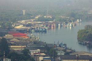 Fishing village Live by the river near the sea Fishing boat docked Waiting out for fish at night photo