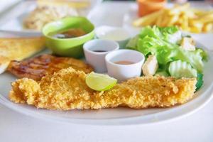 Fish pork and chicken steak meal set - clean fresh food on table concept photo