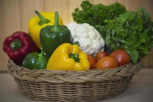 Fresh variety vegetable basket ready to be cooked in the kitchen - vegetable for making food background with copy space concept photo