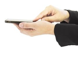 A business mas hands is using - pushing mobile phone. Photo is isolated over white background