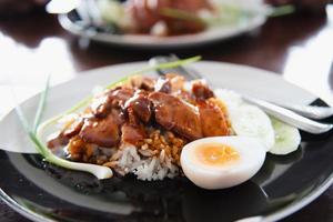 Red pork and rice - famous Thai food recipe photo