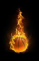 baloncesto, fuego en la mano fondo negro foto