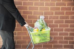 Man is shopping fresh vegetable in supermarket store - man in fresh market lifestyle concept photo