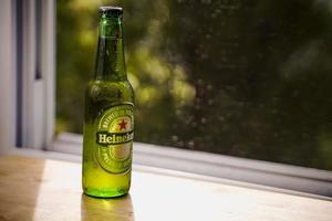 Marinette,WI-Nov29,2021- Heineken Beer, Close on Ice Since 1975, most Heineken beer has been produced at the brewery in Zoeterwoude, Netherlands. photo