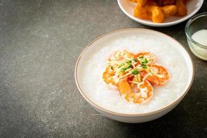 Congee with shrimps and fresh ginger photo