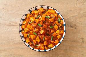 Mapo Tofu - The traditional Sichuan dish of silken tofu and ground beef, packed with mala flavor from chili oil and Sichuan peppercorns. photo