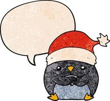 cute cartoon penguin wearing christmas hat and speech bubble in retro texture style vector