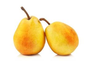 Two yellow fresh ripe pears isolated on white background photo