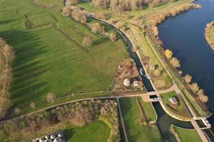 Gorgeous aerial footage and high angle view of British Lake and Roads with Water Birds photo