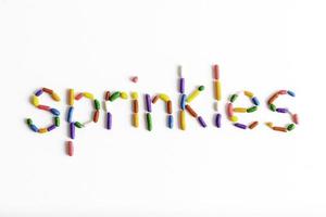 Rainbow Sprinkles on White Background photo