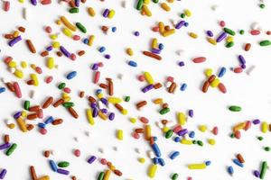 Rainbow Sprinkles on White Background photo