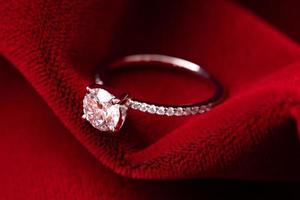 Diamond Wedding Ring Red Fabric photo