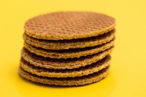 Stroopwafel On Yellow Background photo