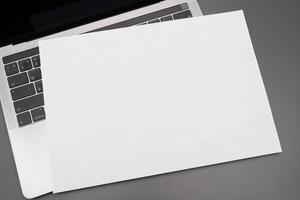 Office table Blank paper with pencil. The blank paper can be used to put some text or images. photo