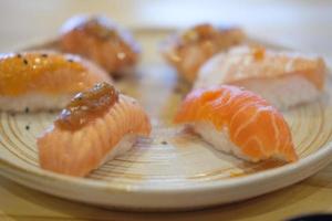 Salmon sushi nigiri grilled or aburi