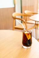 iced cola glass with ice photo