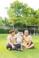 Asian couple love with dog photo