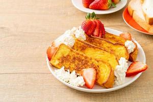 french toast with fresh strawberry and whipping cream photo