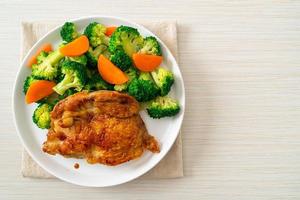 chicken steak with broccoli and carrot photo