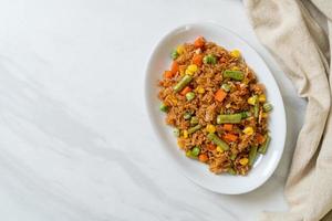 fried rice with green peas, carrot and corn photo