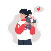 Young woman holding a gift vector