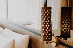 beautiful bedside lamp decoration in bedroom photo