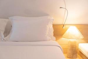 comfortable white pillows on bed photo